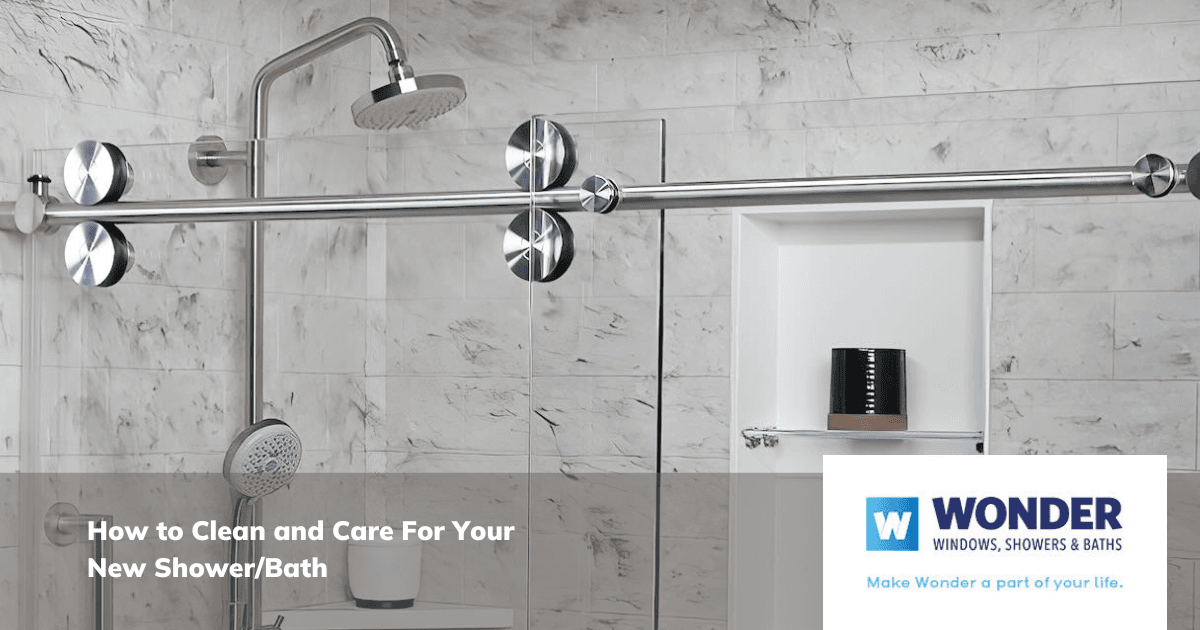 Modern bathroom with a sleek glass shower enclosure, chrome fixtures, and marble walls. Text overlay reads, “How to Clean and Care For Your New Shower/Bath.”