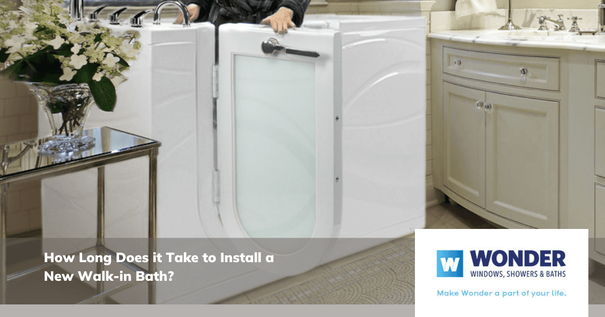 A modern bathroom features a white walk-in bath with a closed door. A person holds the edge for balance. Text reads, "How Long Does it Take to Install a New Walk-in Bath?" A bouquet sits on a glass table nearby. The atmosphere is calm and elegant.