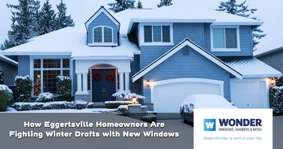 Blue house with snow-covered roof and icicles, highlighting moisture-resistant windows. Text overlay: "Why Moisture-Resistant Windows Matter."