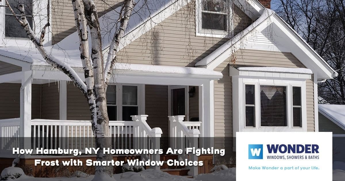A cozy, snow-covered house in Hamburg, NY with frost-resistant windows. A banner reads: "How Hamburg, NY Homeowners Are Fighting Frost with Smarter Window Choices."