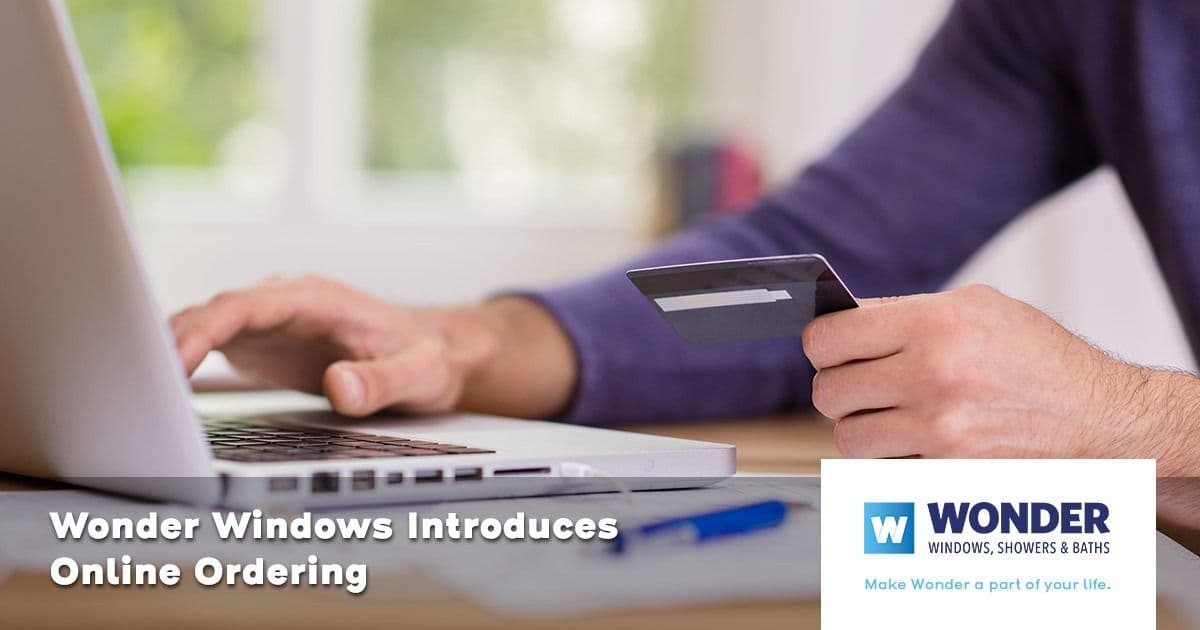 A person holds a credit card while typing on a laptop, signifying online shopping. Text reads "Wonder Windows Introduces Online Ordering." A logo is visible.