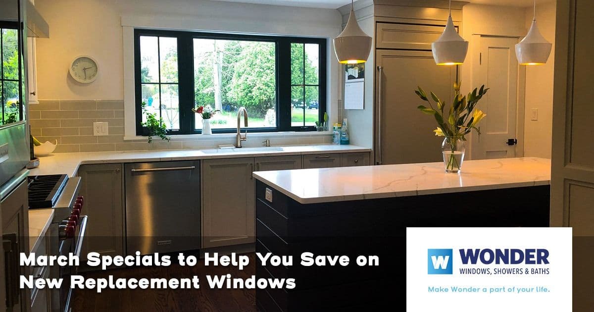 Modern kitchen with large windows, sleek countertops, pendant lights, and plants. Text overlay reads: "March Specials to Help You Save on New Replacement Windows." Logo for Wonder Windows.