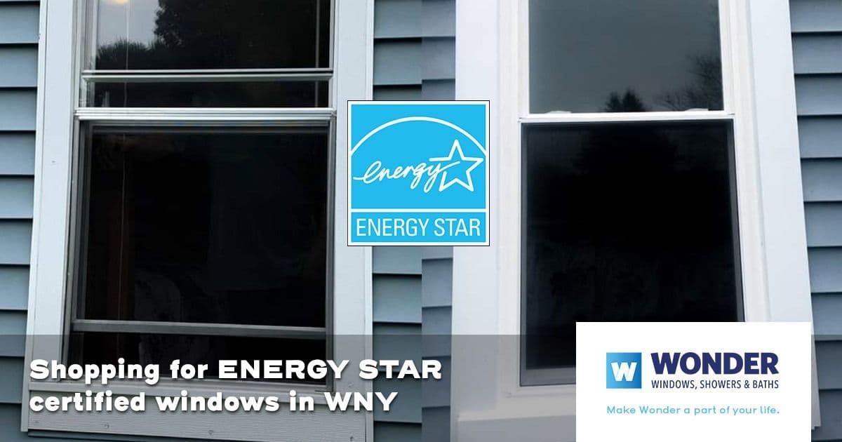 Two windows on a blue-paneled house are shown side by side. An ENERGY STAR logo is centered above text promoting certified windows, with "Wonder Windows" branding in the corner.