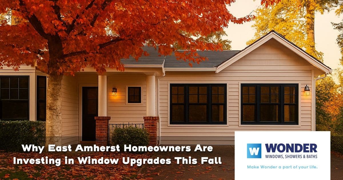 A cozy house with fall foliage and new windows. Text reads, "Why East Amherst Homeowners Are Investing in Window Upgrades This Fall." Wonder Windows logo shown.