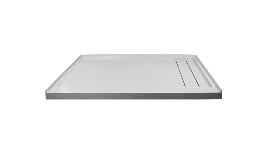 A white rectangular shower base with a linear drain on the right side.